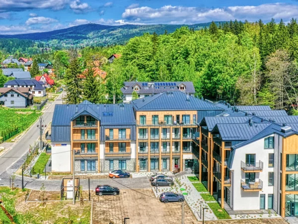 Relax a aktívna dovolenka v poľských Krkonošiach: moderné apartmány, neobmedzená sauna